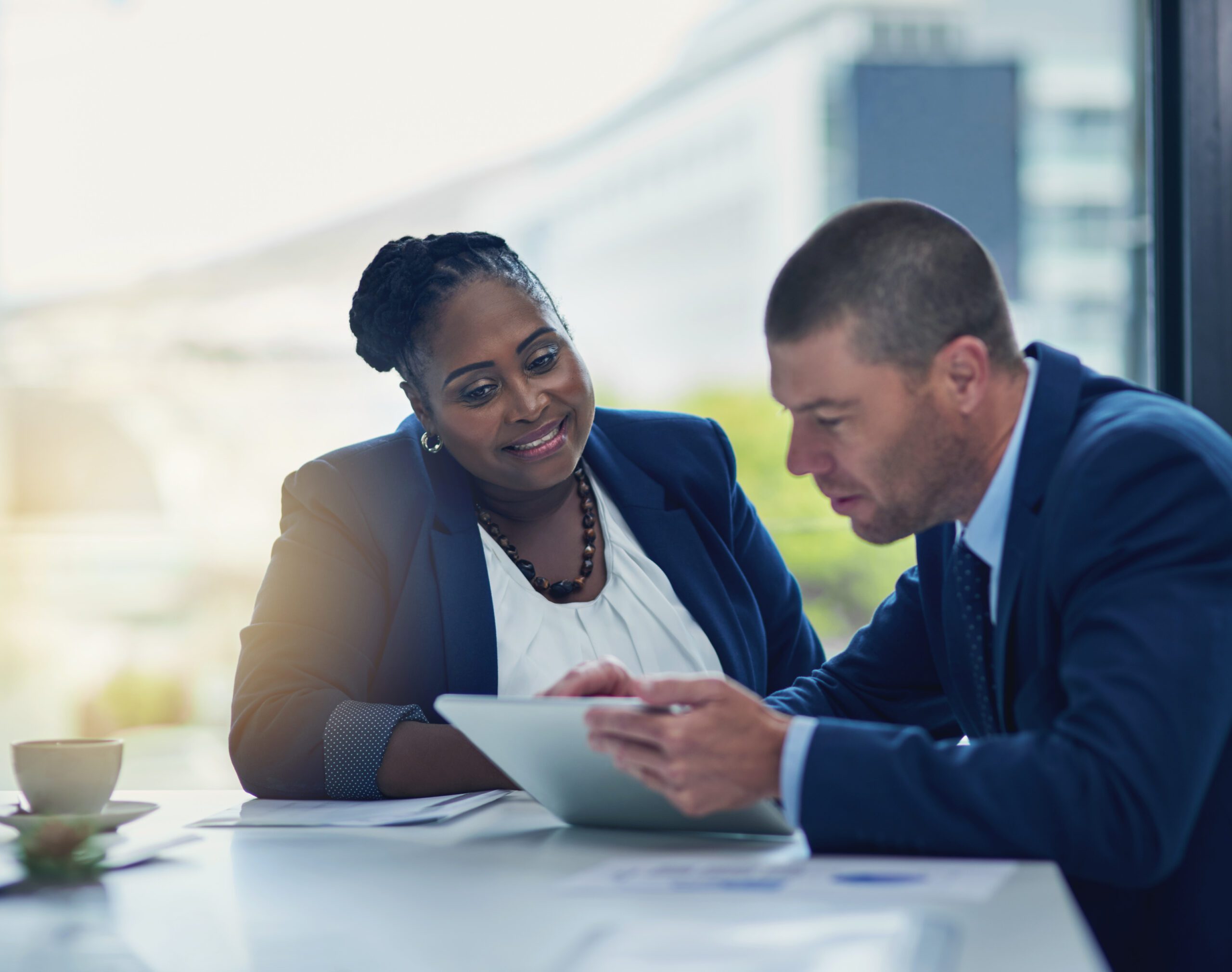 business-meeting-team-tablet-office-feedback-review-online-collaboration-man-woman-technology-discussion-report-internet-smile-results-email-workplace Business meeting, team and tablet in office for feedback, review and online for collaboration. Man, woman and technology or discussion for report, internet and smile for results or email in workplace.